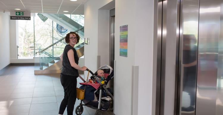 Woman pushing a pram