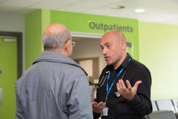 Doctor speaking with patient